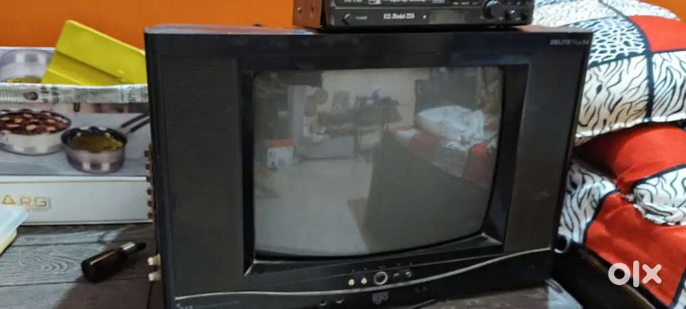 Old TV with seter box and audio cabel