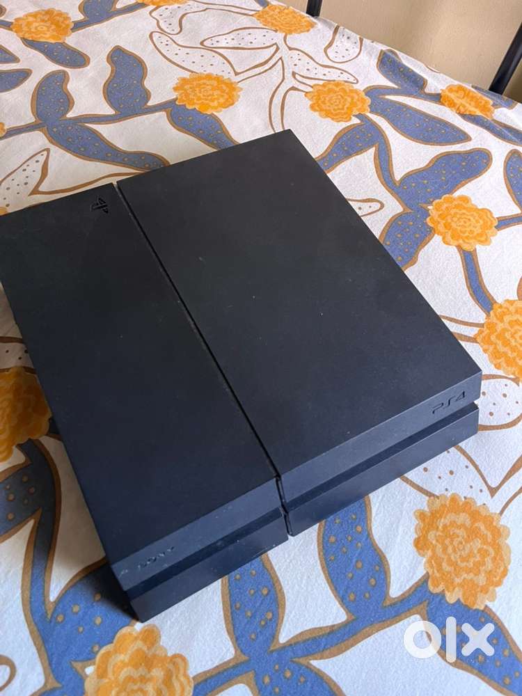 PS4 Slim 1TB - Mint Condition with 1 dual shock controller
