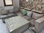 A 7 sitter sofa set is in a good condition, Heavy wooden quality.