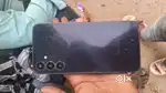 Full hd+ amoled display triple camera setup 50 mp main,wide camera