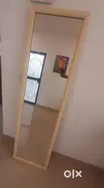 Wall mounted mirror frame with wooden border for SALE Rs. 3000/-