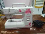 Usha Janome ALLUXE DLX Machine