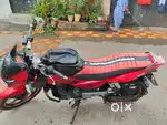 Red colour pulsar good condition bike