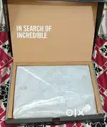 Box opened New Asus laptop available