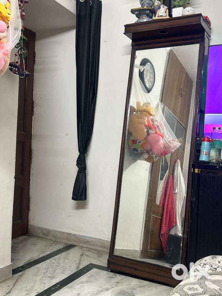 Mirror with rack