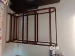 A wooden Alna/Cloth Rack/Garment Rack