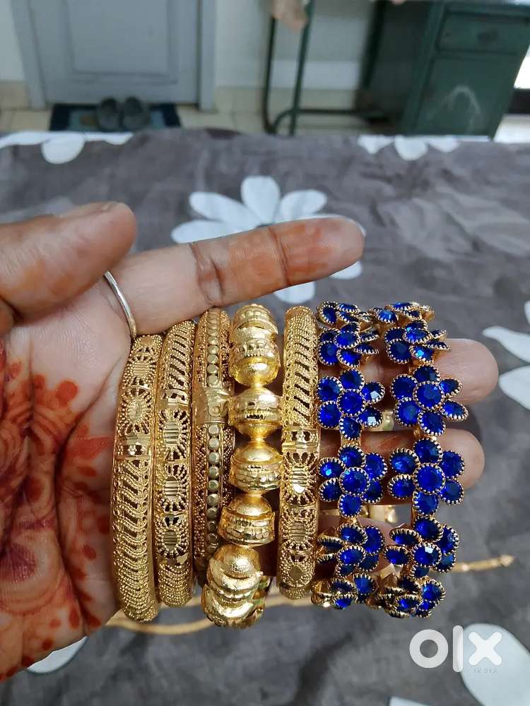 Gold covering ornaments. Aranjanam. Valakal chain