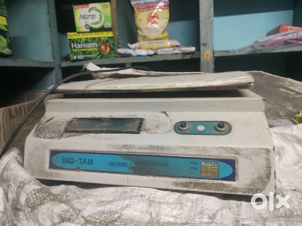 Weighing machine scale