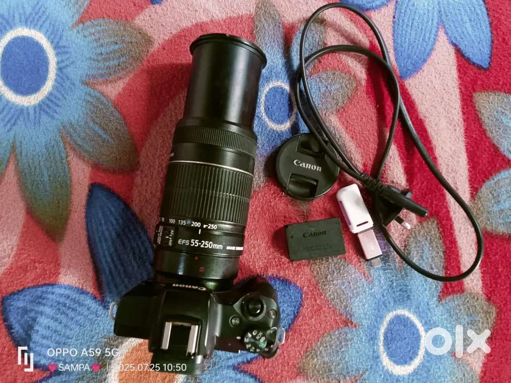 Cannon with lens 55/250