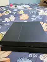 PS4 WITH 5 GAMES