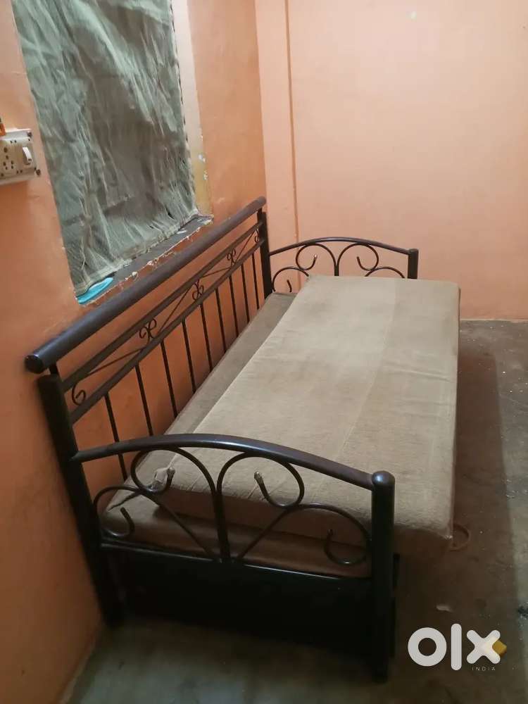 Sofa cum bed with mattress and extra iron chair