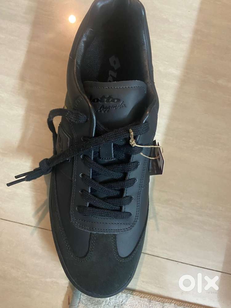 completely unused lotto sneaker, black clean leather size uk10.