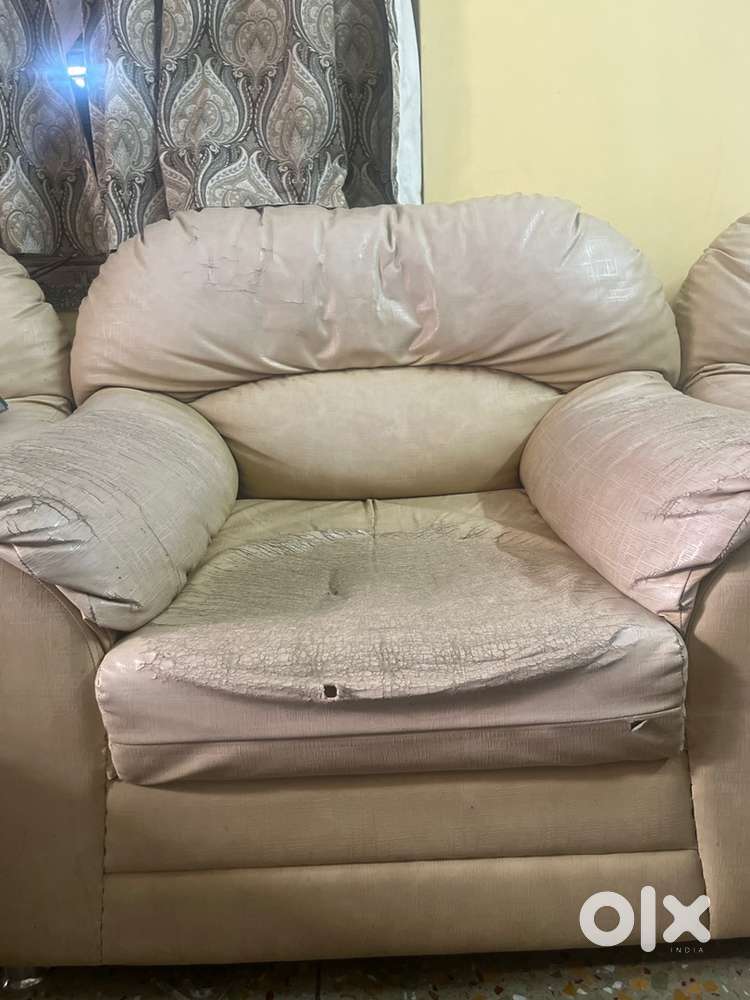 Rexine , cream coloured sofa