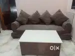 3 seater sofa and cushions with center table