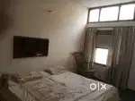 Spacious one bed room set with attached bathroom and kitchenette