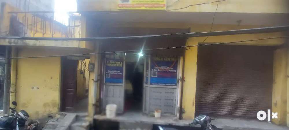 A double story commercial kothi with 2 shops for sale in raja bazar