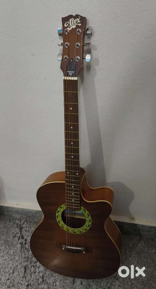 Guitar (Brand- Alex) Less than 1 year old
