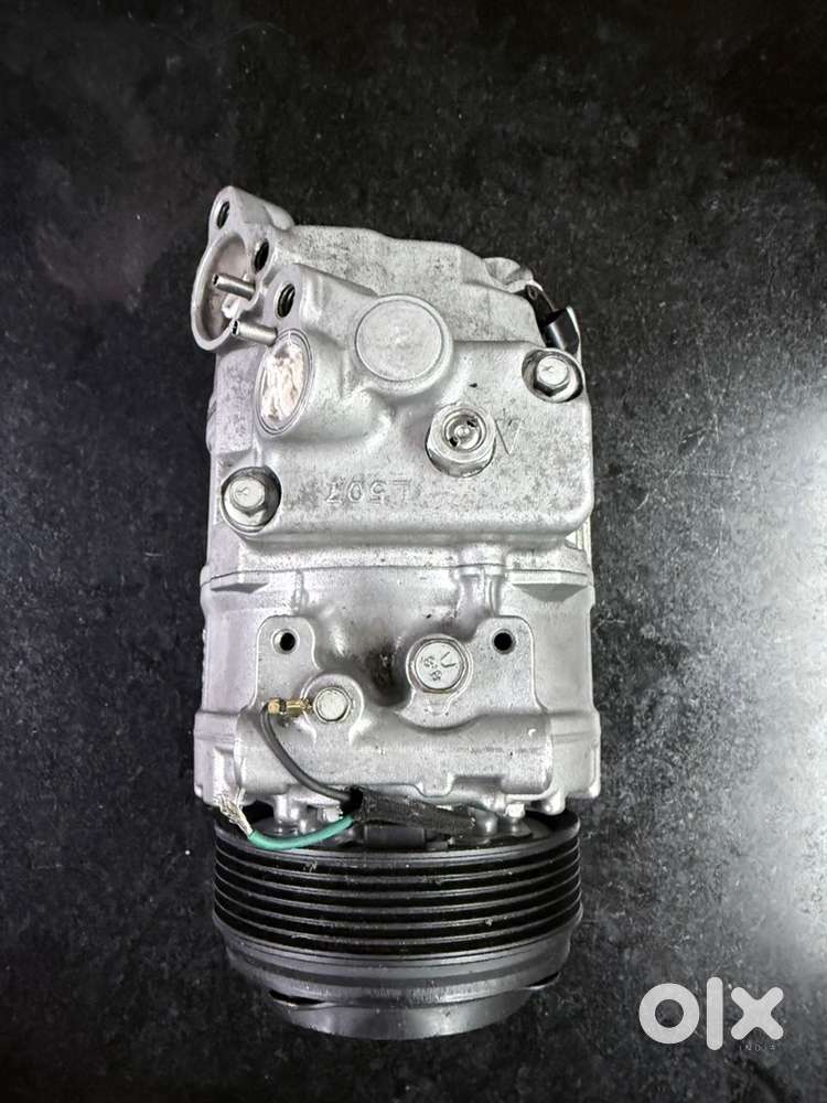 BMW DENSO ORIGNAL COMPRESSOR 100 ORIGINAL AND NEW CONDITION.