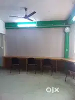 Furnished  office with computer tables for 10 staff and .3 shift workg