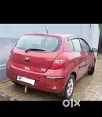 Hyundai i20 in excellent condition model- 2010 berry red colour