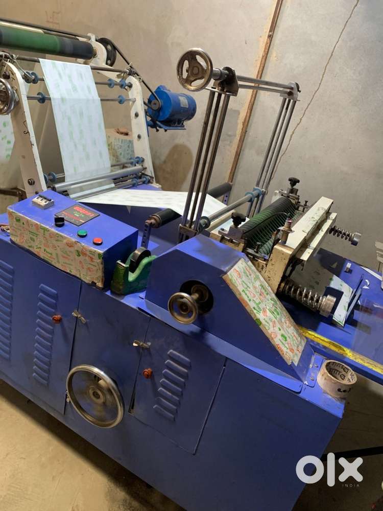 Butter paper roll to sheet cutting machine