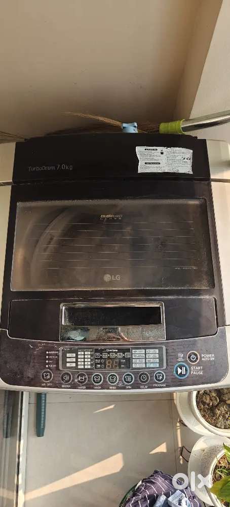 Want to sell LG washing machine 7 year old, good condition top load7KG