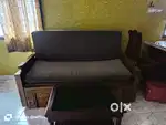Teak wood sofa cum bed with tea table (sofa cover included)