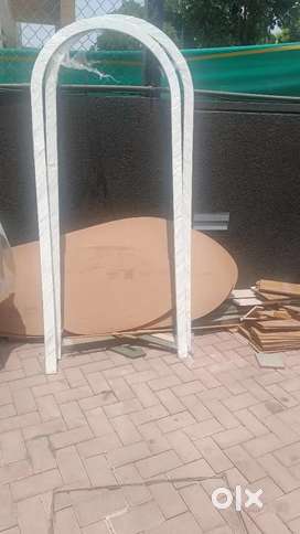 arch-shaped door or window frame components, possibly  