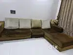 Brown L-shaped 6-seater sofa with left-side orientation.