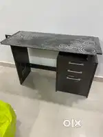 Multi purpose table with three drawers along with corner unit