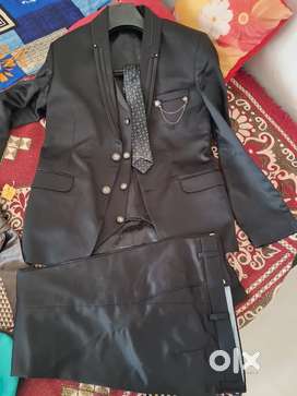 A new 3 piece suit, unused at a very low price