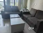 4 seater sofa with 2 ottoman and centre table