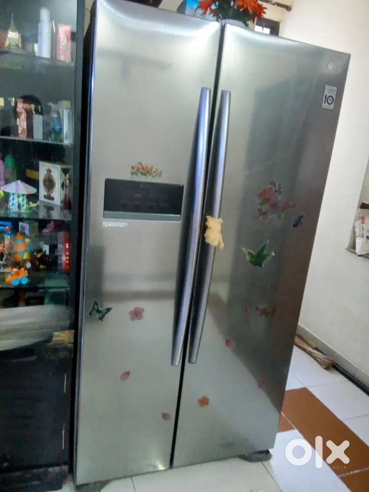 Lg side by side double door fridge samsung washing machine and Led tv