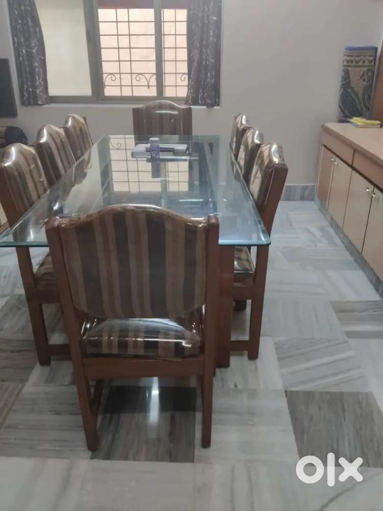 Dining table, sofa set,  small table.