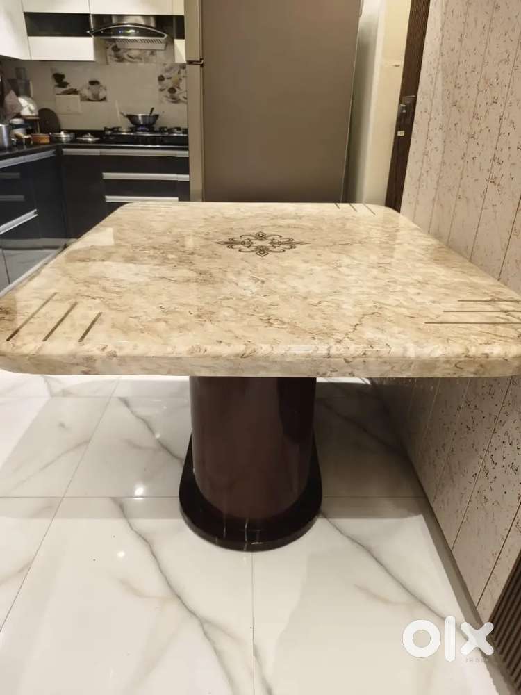 4 seater dining table for sale with marble top and 4 cushioned chairs