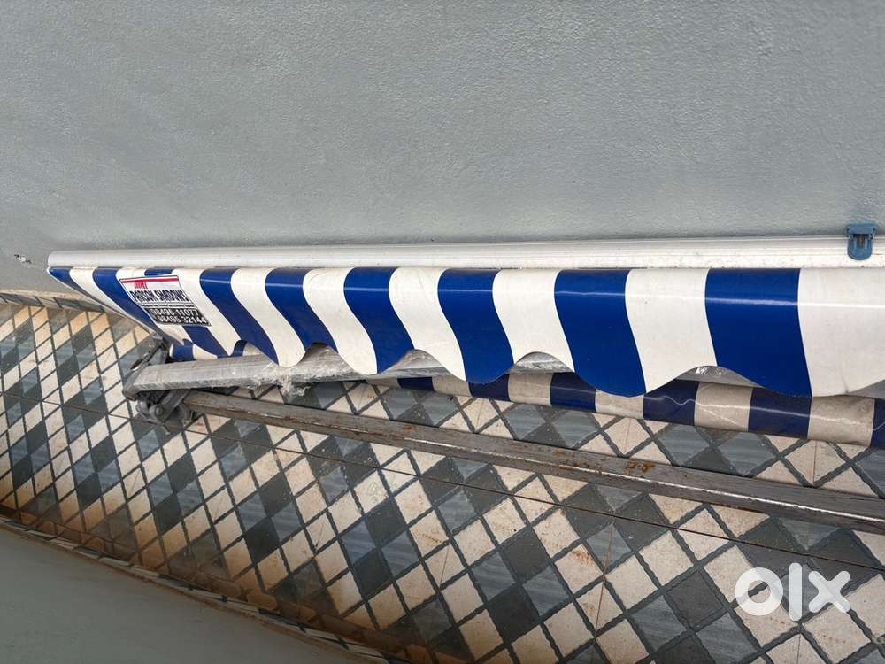 Rolling sunshade For shops and car parking