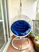 Large metal swing with stand and cushion