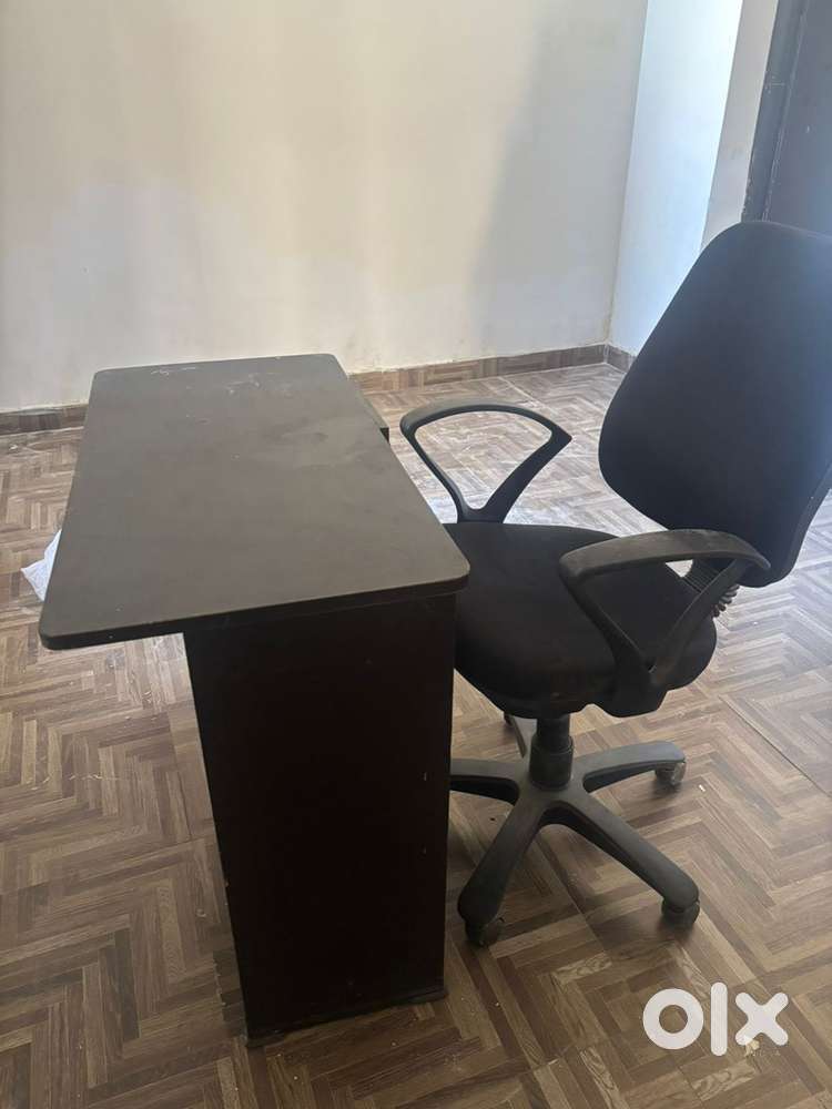 Computer table with revolving chair