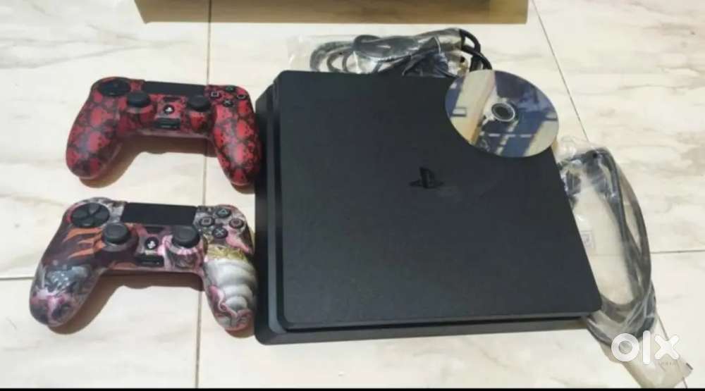 PS4 1 TB with 2 original controllers like new condition