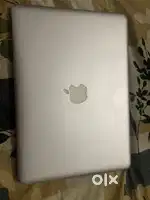 MacBook pro with bill and box