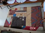 Flashy and colourful drawing room carpet in perfect condition