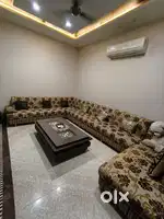 13 seater sofa with center table in geniun condition with branded foam