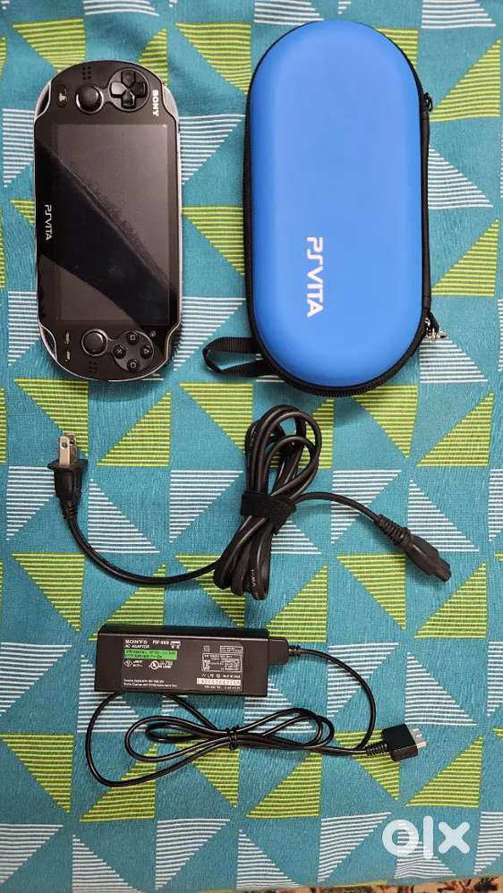 PS Vita Excellent Condition with Games, OG Charger and Case, 64GB Card