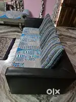Leather sofa with center table