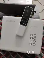 Wzatco Yuva Plus 4K Projector + boAt Aavante Bar Woofer Combo