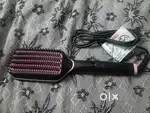 Vega hair straightener brush