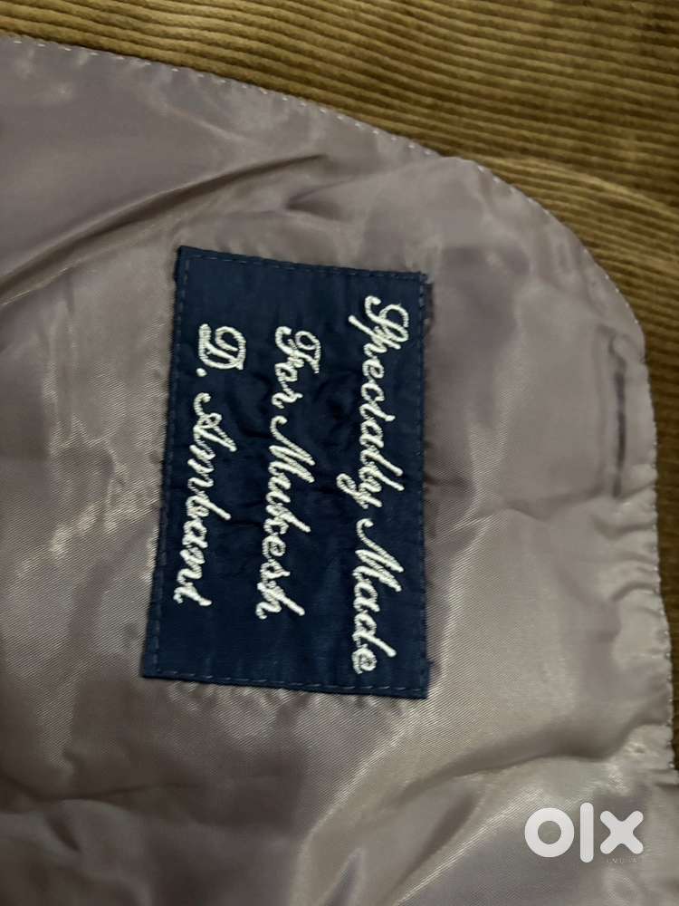 Mukesh Ambani’s Blazzer with name