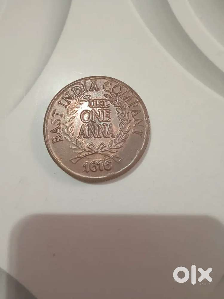 I want to sell 1616 one anna coin and 1 more coin starhanuman ji pics