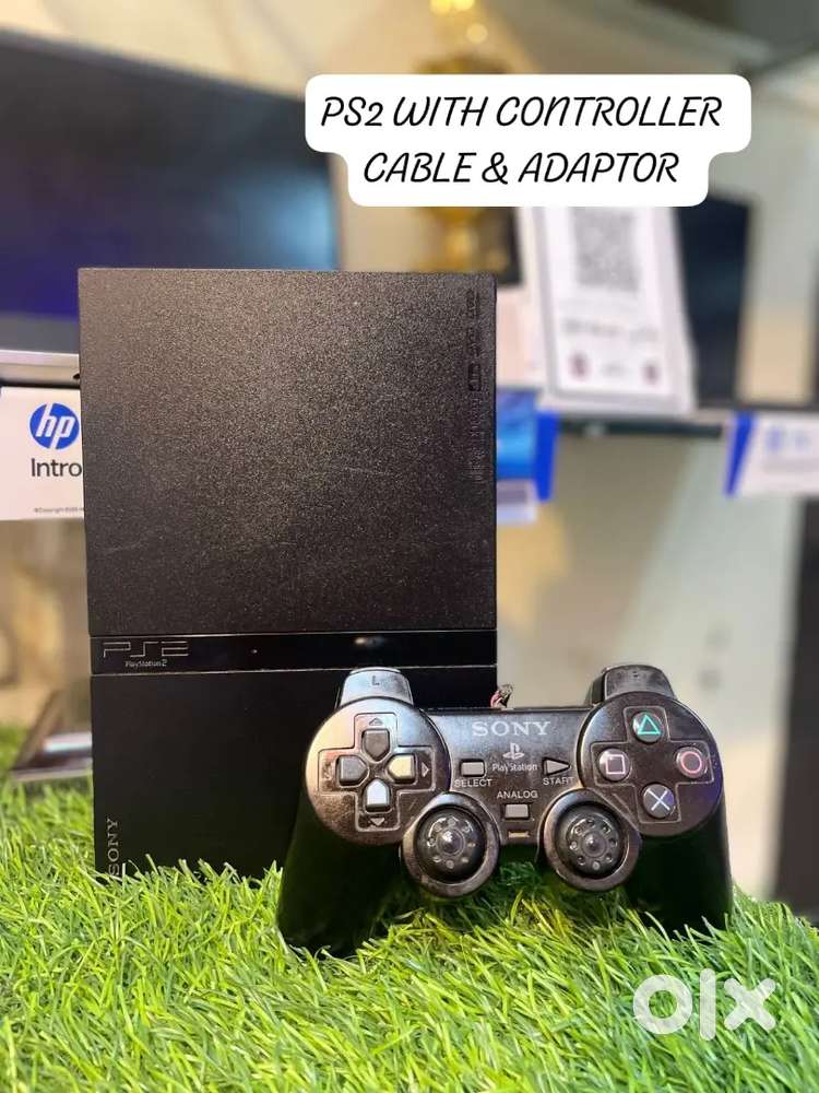 SONY PLAYSTATION 2 WITH CONTROLLER CABLE & ADAPTOR CONDITION GOOD