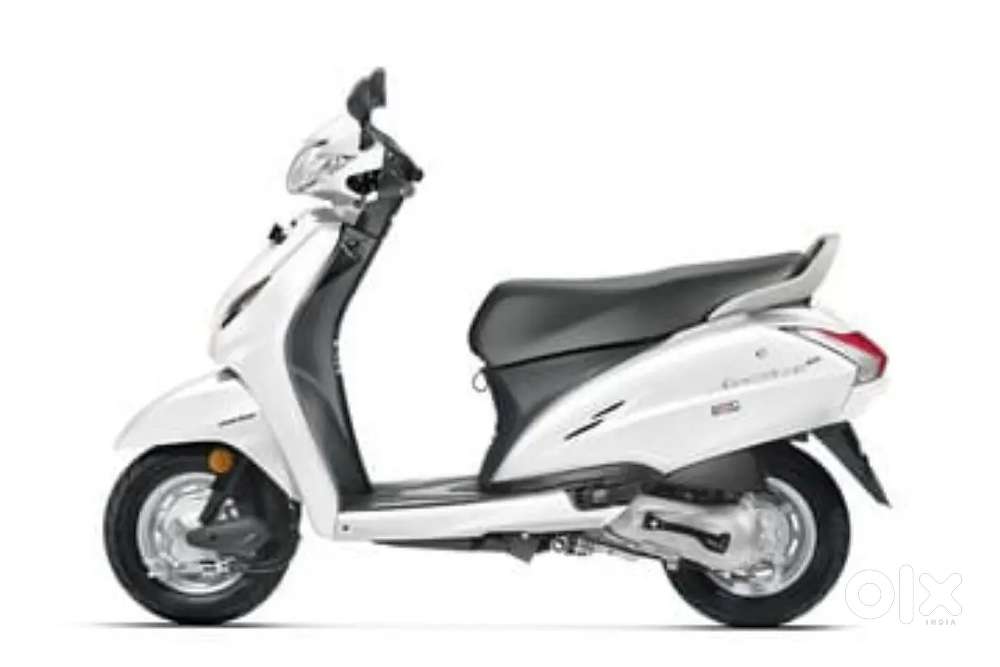 Activa 4G white Very less driven with guarantee Good condition